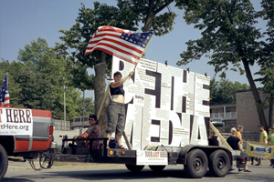 July 4th Parade, 2003; Billboard float by Your Art Here co-founders that participated in the Bloomington 4th of July Parade, and was subsequently hung on Billboard 101. Media Conglomerate, Collaboration by Your Art Here co-founders, Shana Berger, Alyssa Hill, Owen Mundy, and Nathan Purath thumbnail-7